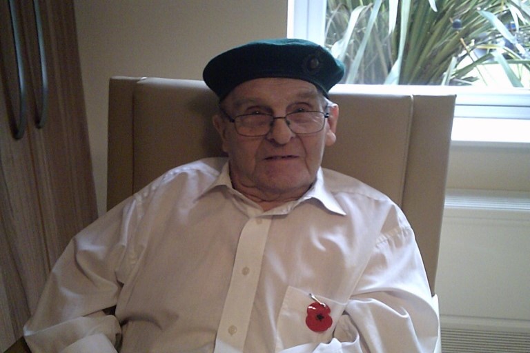 Resident in his beret and poppy.