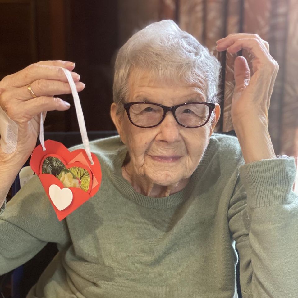 Our residents with the valentine's day cards they made