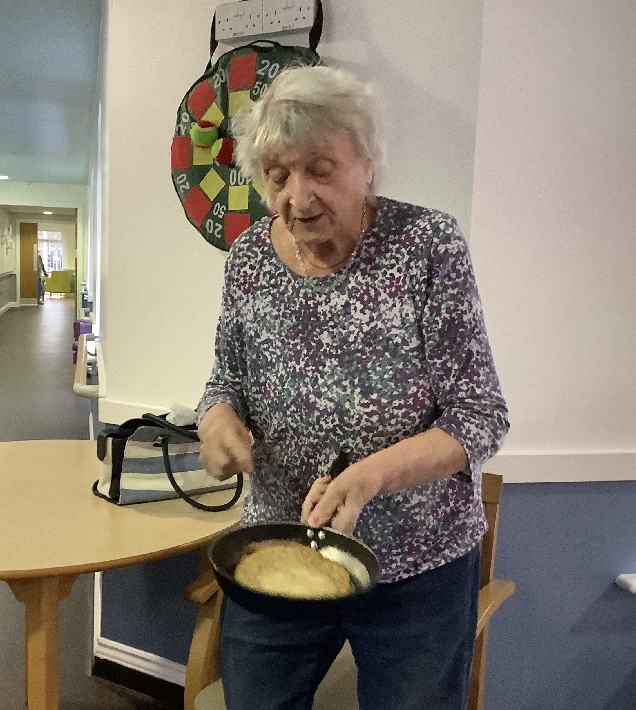 Residents tossing pancakes 