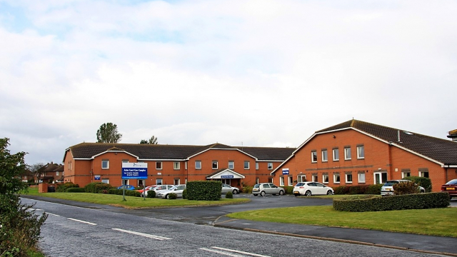 Astor Court building and roadside 
