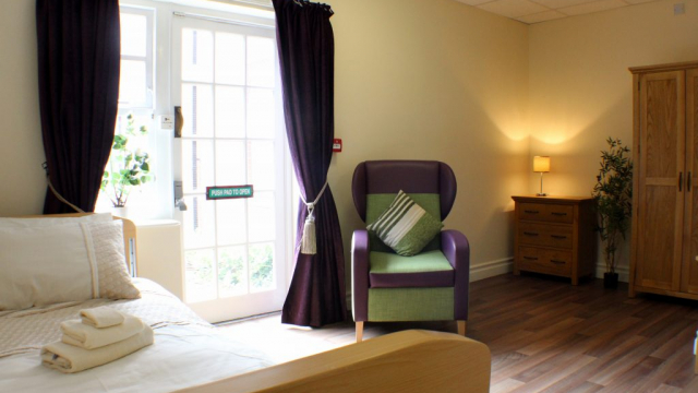 Garden Hill bedroom with outside doors 