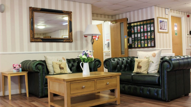 Willowdene reception with notice board and seats 