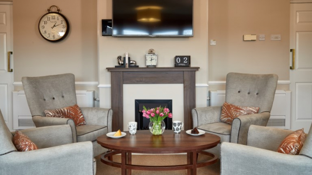 Kents Hill lounge with TV and fireplace