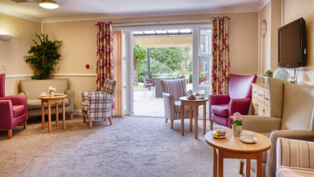 Chestnut Court social area with patio doors into the garden