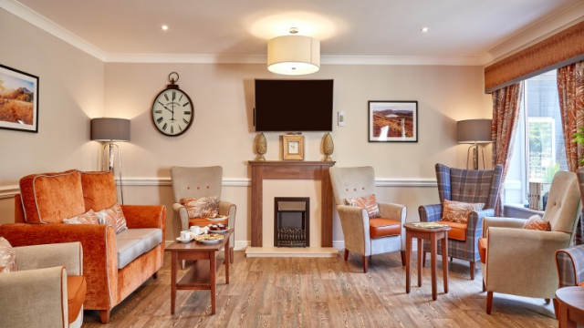 Ashmead lounge with TV and fire place