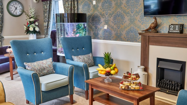 Abingdon Court Lounge area near fireplace 