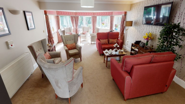 Parkview House seating area with TV