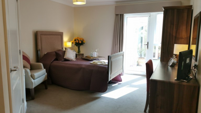 Buckingham House bedroom with patio doors 