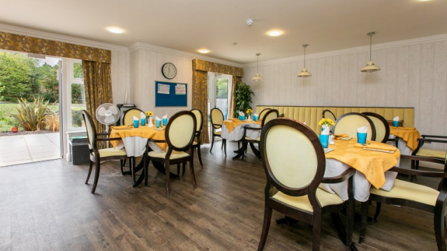 Kingsbury Court dining area with patio doors