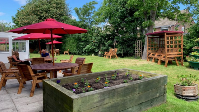 Earsdon Grange garden with outdoor seating 