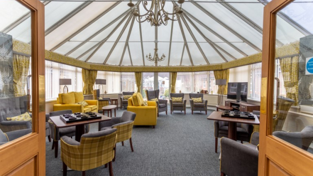 Monread Lodge conservatory with seating 