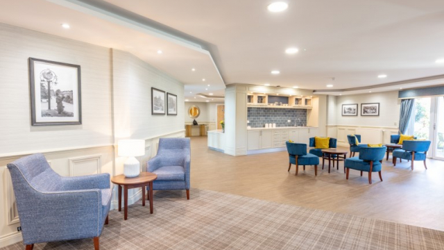 Belmont House social area with seating and kitchen area 