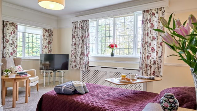 Furze Hill bedroom with large windows 