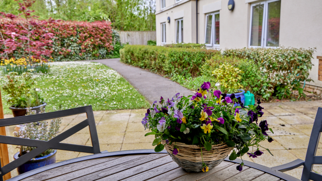 Brunel House Gardens with outdoor seating and flowers 