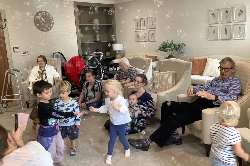 Windsor Court's intergenerational day playing with bubbles
